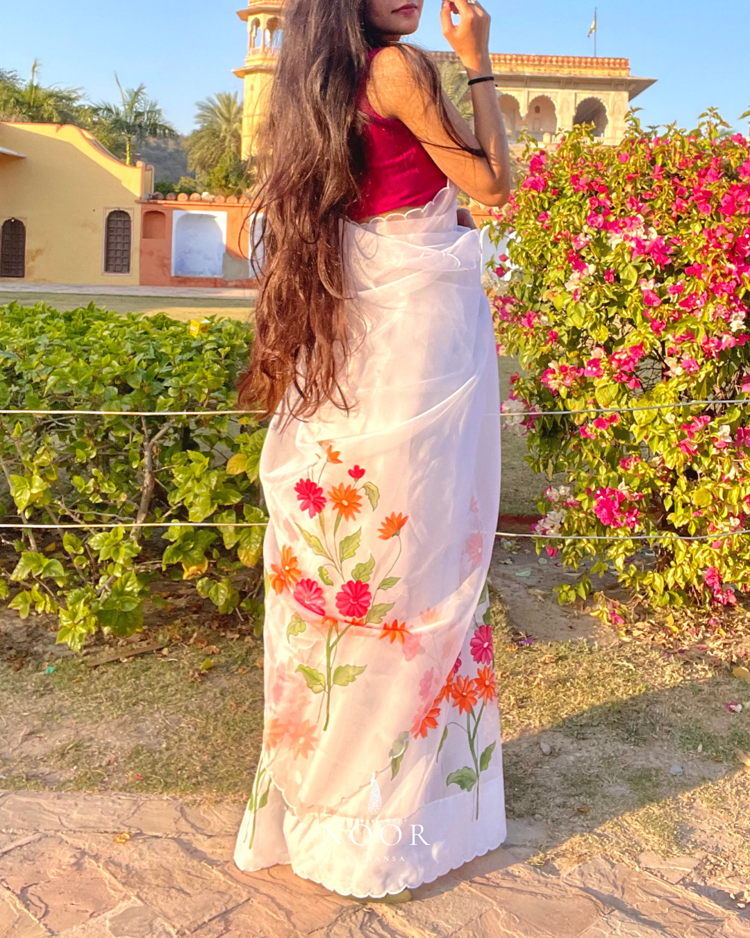 hand painted saree in pure organza silk by noor by hansa in white colour paired with a pure cotton blouse piece & scallop cutwork