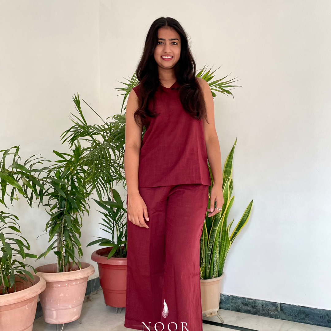 cotton wine noor by hansa v-neck co-ord set that’s as comfy as your favourite loungewear but sharp enough for the office! hand-made from an ultra-soft cotton blend, it stays vibrant wash after wash with zero colour bleeding. perfect for those days when you want to feel cozy and look effortlessly chic!