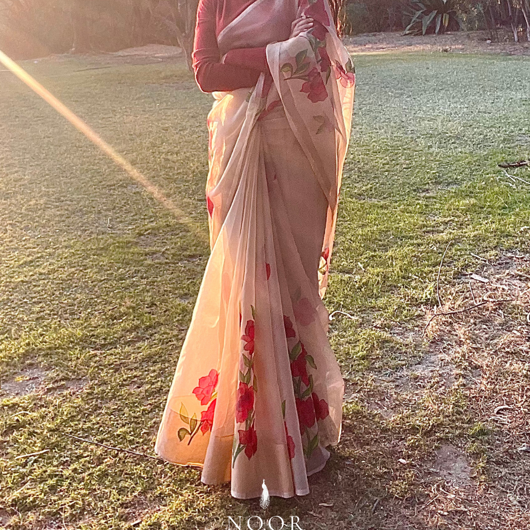 hand painted saree in pure organza silk by noor by hansa in beige colour paired with a pure cotton blouse piece