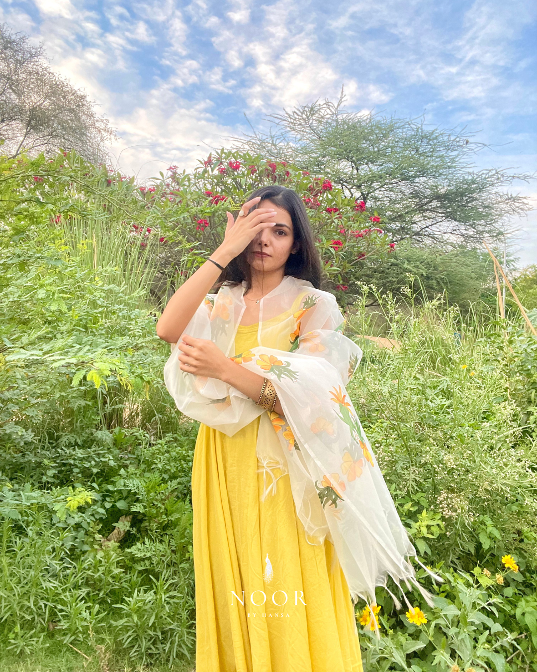 hand painted ivory 'fanaa' odhani in pure organza silk with whimsical yellow motifs, studded with minimal gold stones and edged with fringes