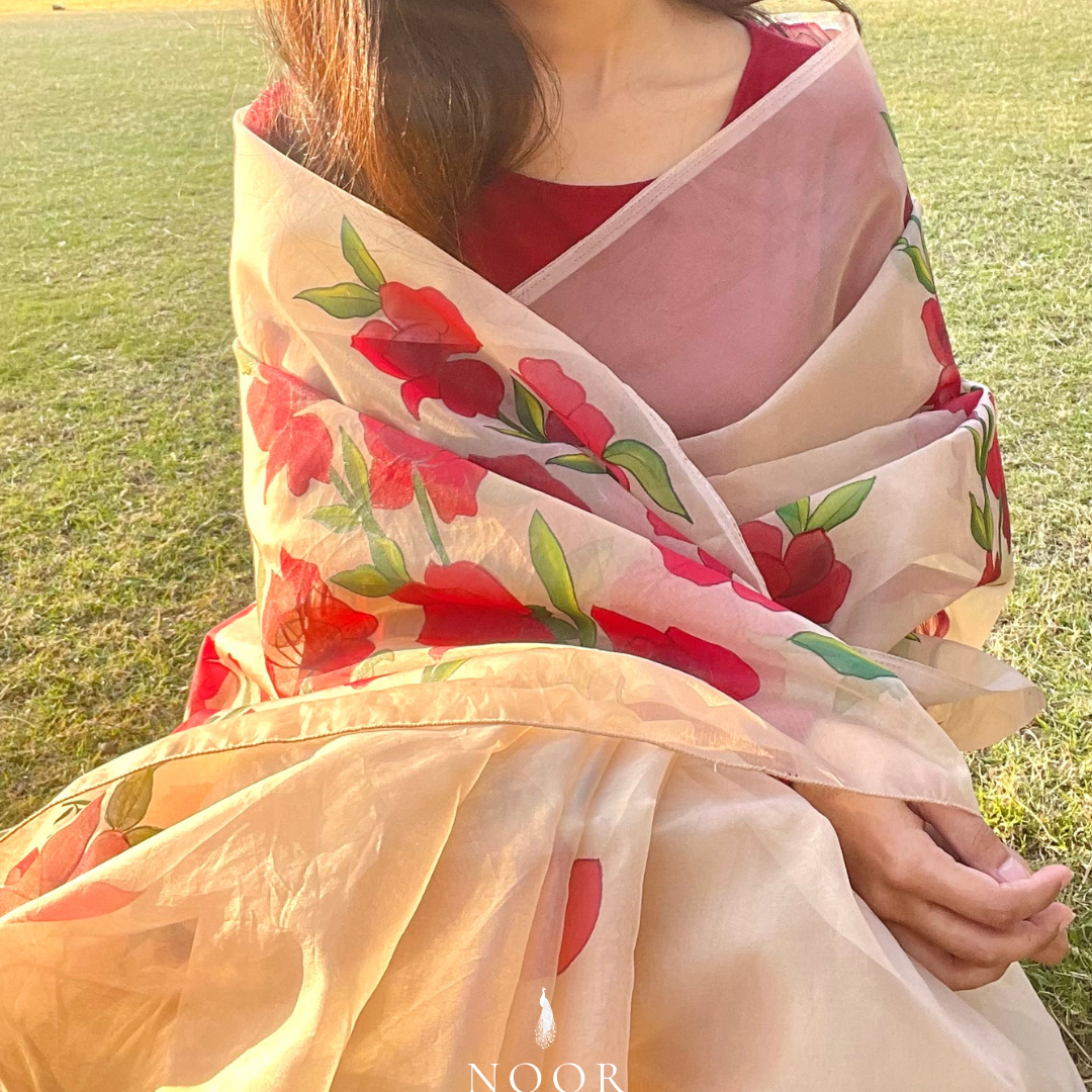hand painted saree in pure organza silk by noor by hansa in beige colour paired with a pure cotton blouse piece