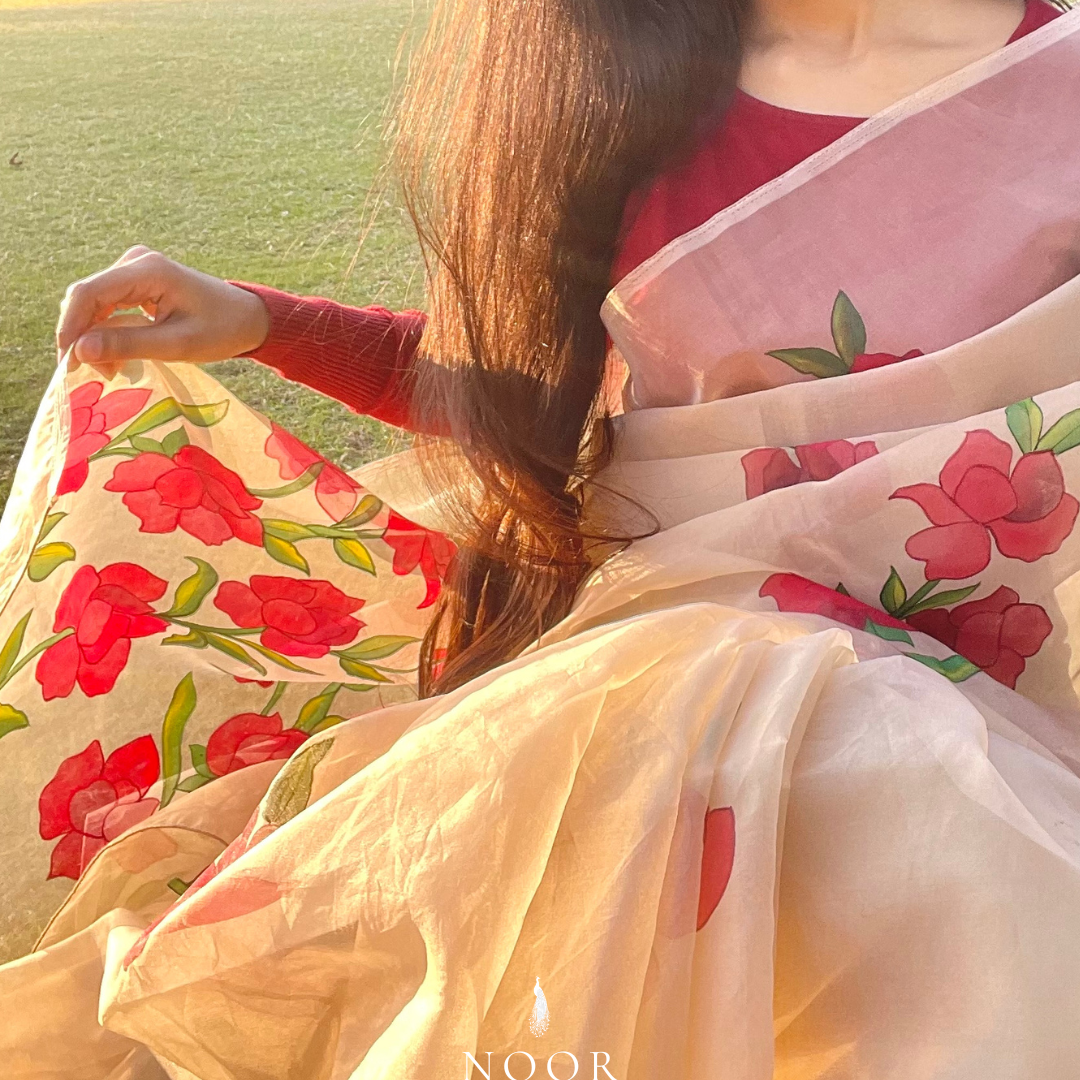 hand painted saree in pure organza silk by noor by hansa in beige colour paired with a pure cotton blouse piece