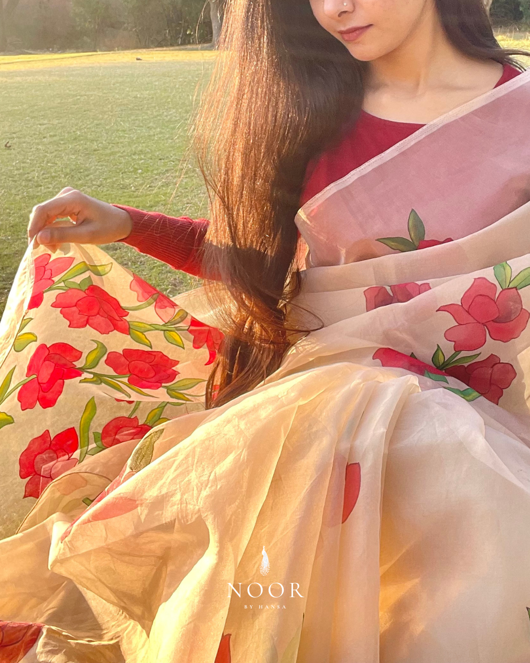 hand painted saree in pure organza silk by noor by hansa in beige colour paired with a pure cotton blouse piece