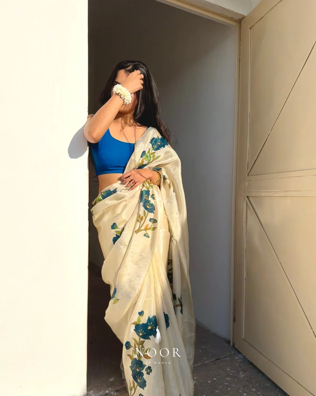 hand painted saree in tissue silk by noor by hansa paired with a blue blouse, hand painted sarees
handpainted sarees
handpainted sari
hand painted saris
jaipur sarees
handcrafted saris
organza silk sarees
tissue sarees
tissue saris
organza silk saris
noorbyhansa
noor by hansa