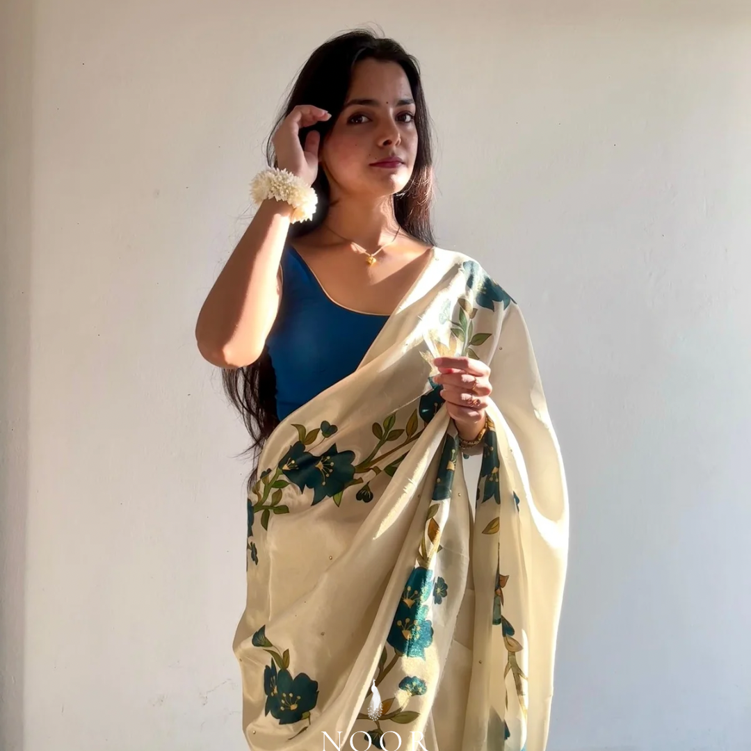 hand painted saree in tissue by noor by hansa, paired with a blue blouse, hand painted sarees
handpainted sarees
handpainted sari
hand painted saris
jaipur sarees
handcrafted saris
organza silk sarees
tissue sarees
tissue saris
organza silk saris
noorbyhansa
noor by hansa