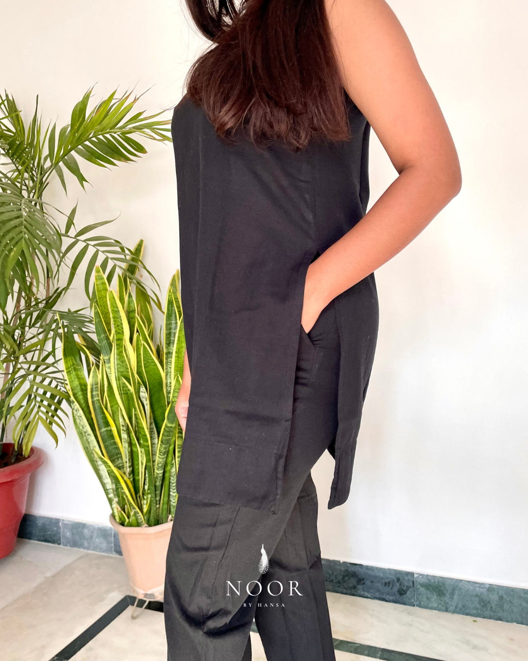 black cotton linen noor by hansa kurta co-ord set, crafted from a luxe linen-cotton blend that feels as good as it looks. available in five vibrant colours, this playful set is perfect for office wear or a day full of running errands
