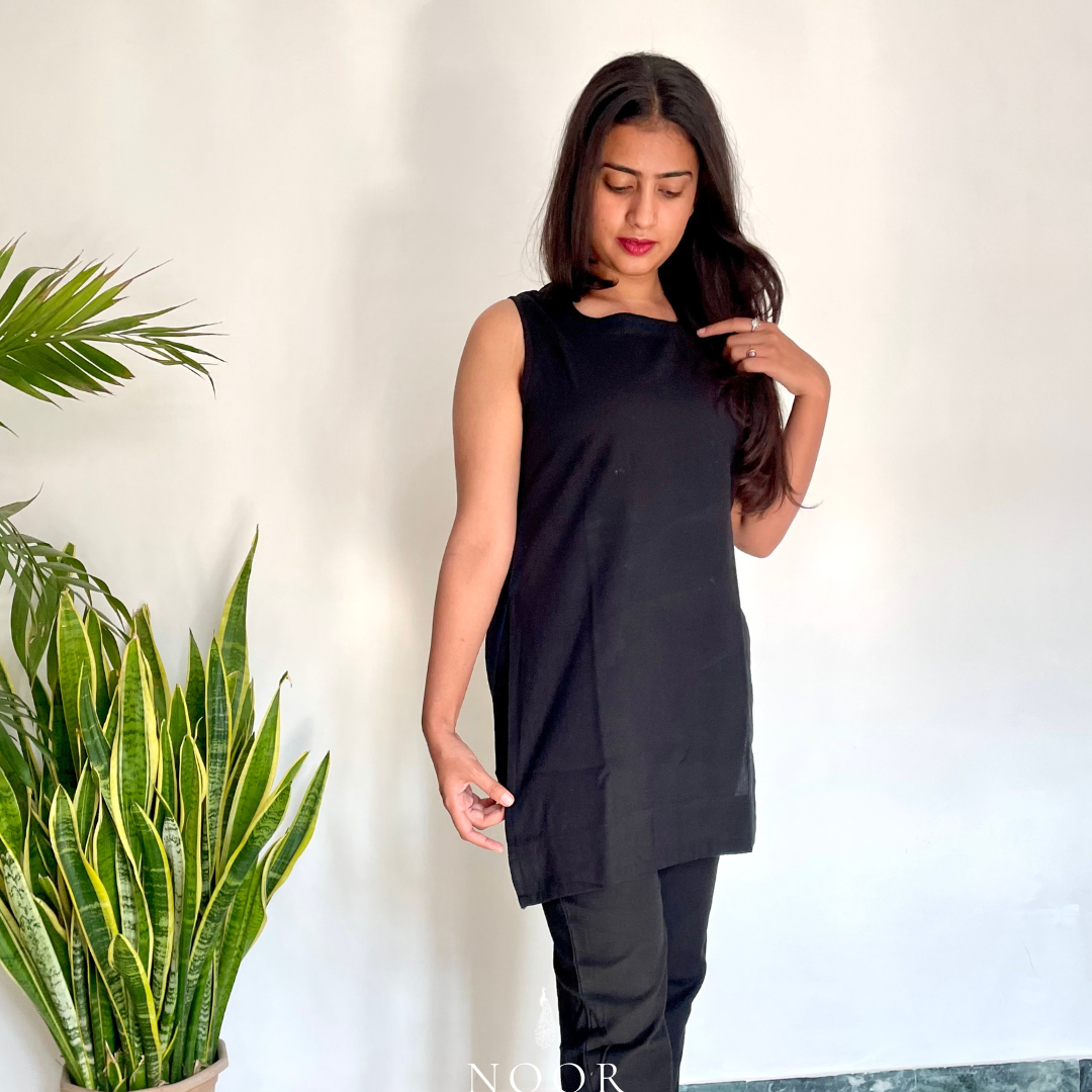 black cotton linen noor by hansa kurta co-ord set, crafted from a luxe linen-cotton blend that feels as good as it looks. available in five vibrant colours, this playful set is perfect for office wear or a day full of running errands