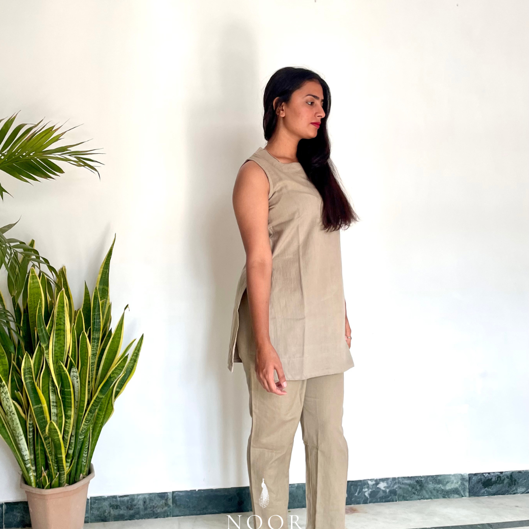grey cotton linen noor by hansa kurta co-ord set, crafted from a luxe linen-cotton blend that feels as good as it looks. available in five vibrant colours, this playful set is perfect for office wear or a day full of running errands