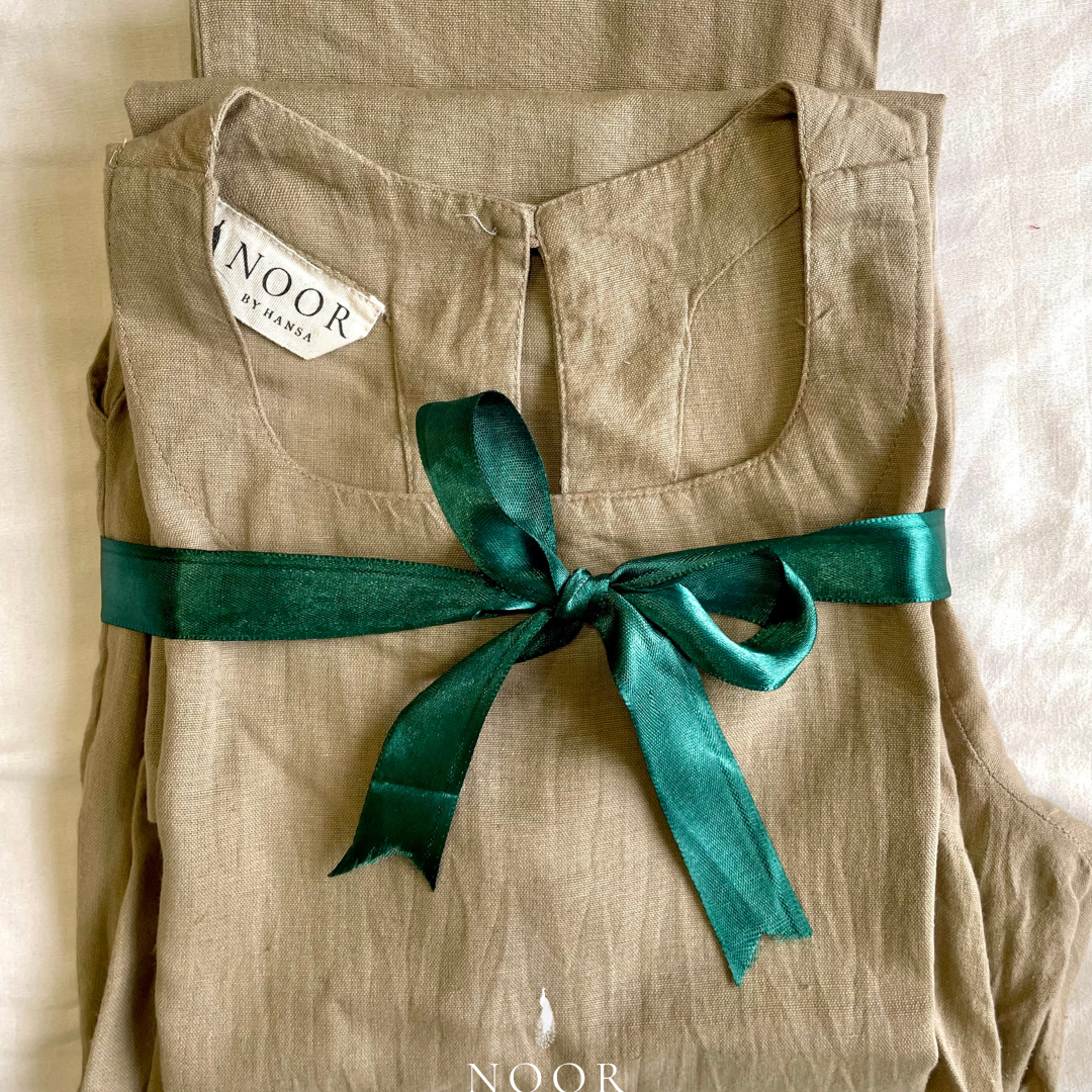 grey cotton linen noor by hansa kurta co-ord set, crafted from a luxe linen-cotton blend that feels as good as it looks. available in five vibrant colours, this playful set is perfect for office wear or a day full of running errands