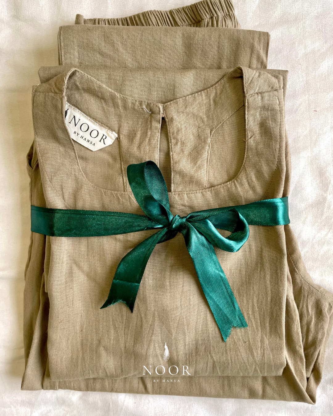 grey cotton linen noor by hansa kurta co-ord set, crafted from a luxe linen-cotton blend that feels as good as it looks. available in five vibrant colours, this playful set is perfect for office wear or a day full of running errands