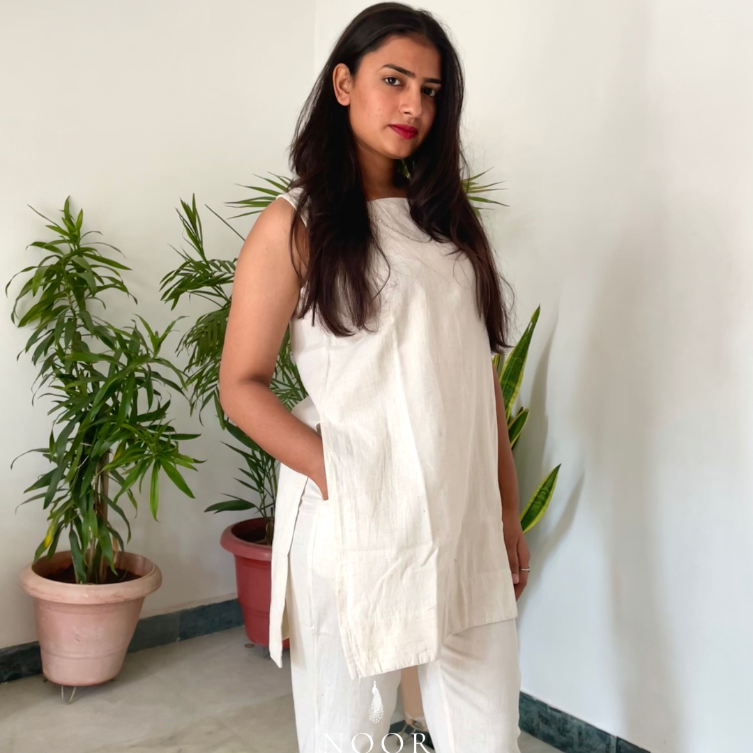 ecru white beige cotton linen noor by hansa kurta co-ord set, crafted from a luxe linen-cotton blend that feels as good as it looks. available in five vibrant colours, this playful set is perfect for office wear or a day full of running errands