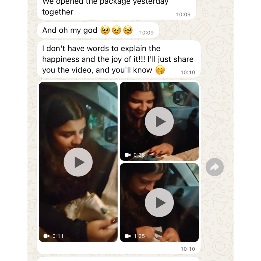 Text conversation with video clips of two people opening a package together.