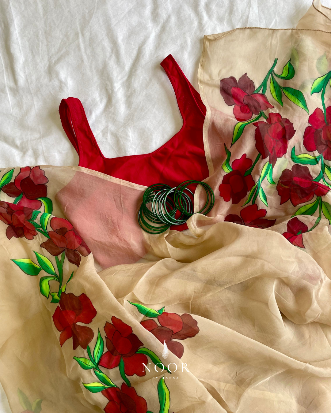 hand painted saree in pure organza silk by noor by hansa in beige colour paired with a pure cotton blouse piece
hand painted sarees
handpainted sarees
handpainted sari
hand painted saris
jaipur sarees
handcrafted saris
organza silk sarees
tissue sarees
tissue saris
organza silk saris
noorbyhansa
noor by hansa