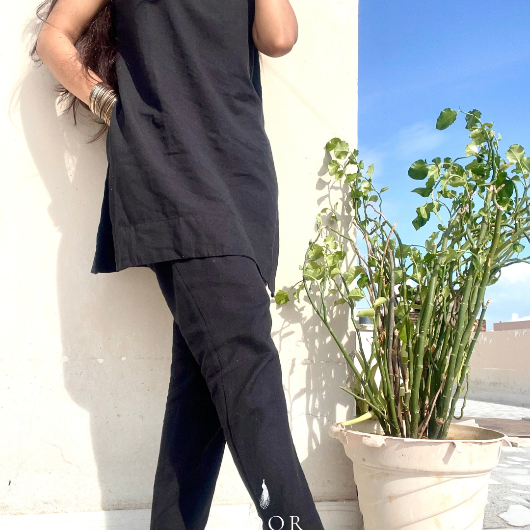 black cotton linen noor by hansa kurta co-ord set, crafted from a luxe linen-cotton blend that feels as good as it looks. available in five vibrant colours, this playful set is perfect for office wear or a day full of running errands