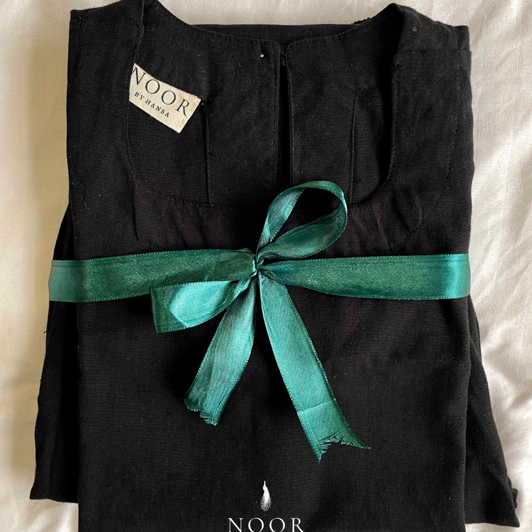 black cotton linen noor by hansa kurta co-ord set, crafted from a luxe linen-cotton blend that feels as good as it looks. available in five vibrant colours, this playful set is perfect for office wear or a day full of running errands