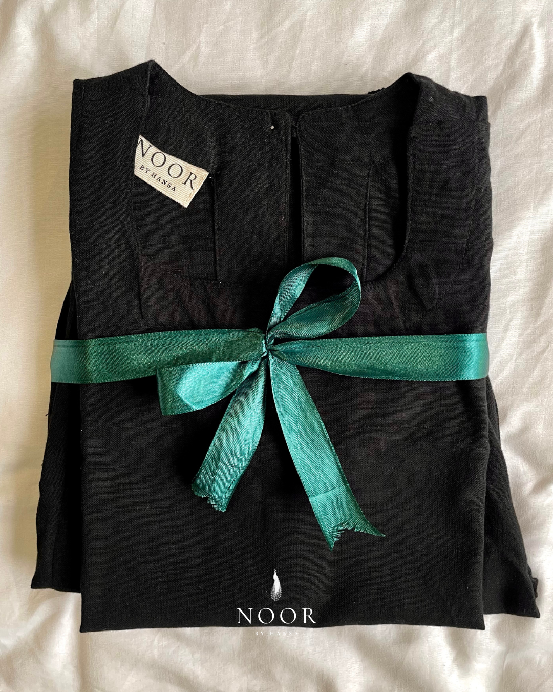 black cotton linen noor by hansa kurta co-ord set, crafted from a luxe linen-cotton blend that feels as good as it looks. available in five vibrant colours, this playful set is perfect for office wear or a day full of running errands