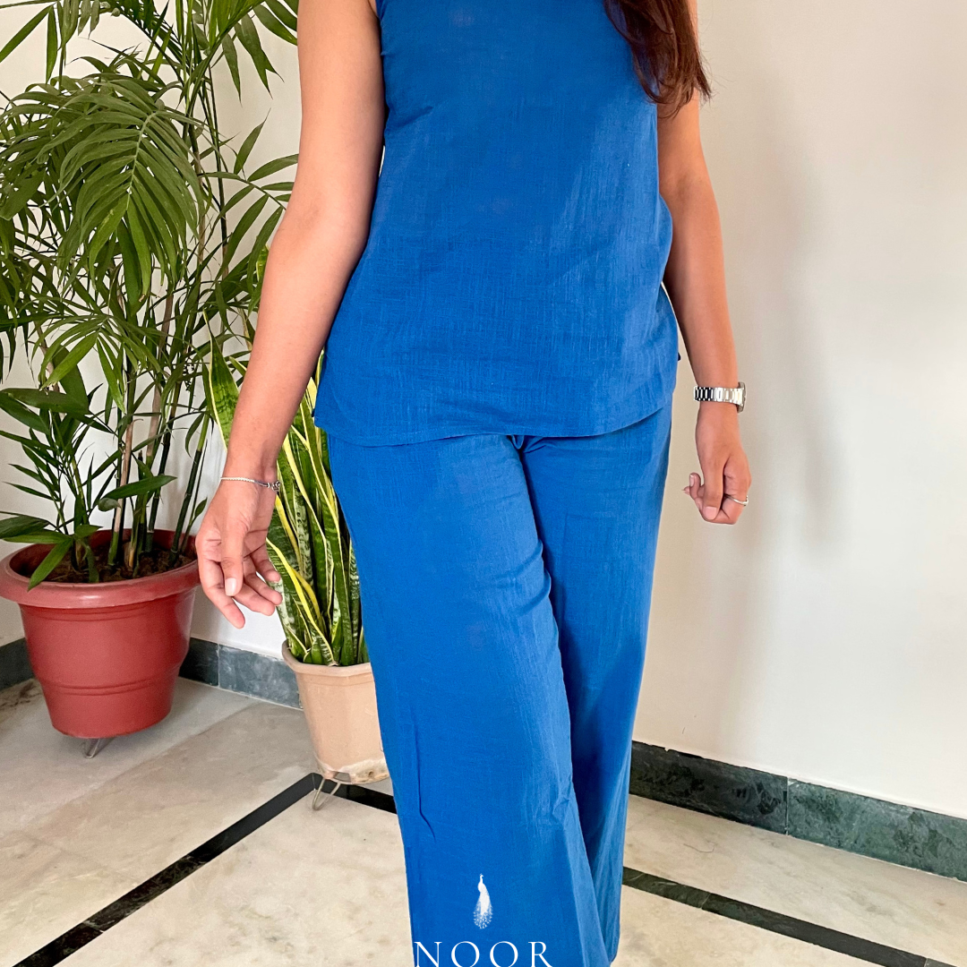 blue cotton noor by hansa v-neck co-ord set that’s as comfy as your favourite loungewear but sharp enough for the office! hand-made from an ultra-soft cotton blend, it stays vibrant wash after wash with zero colour bleeding. perfect for those days when you want to feel cozy and look effortlessly chic!
