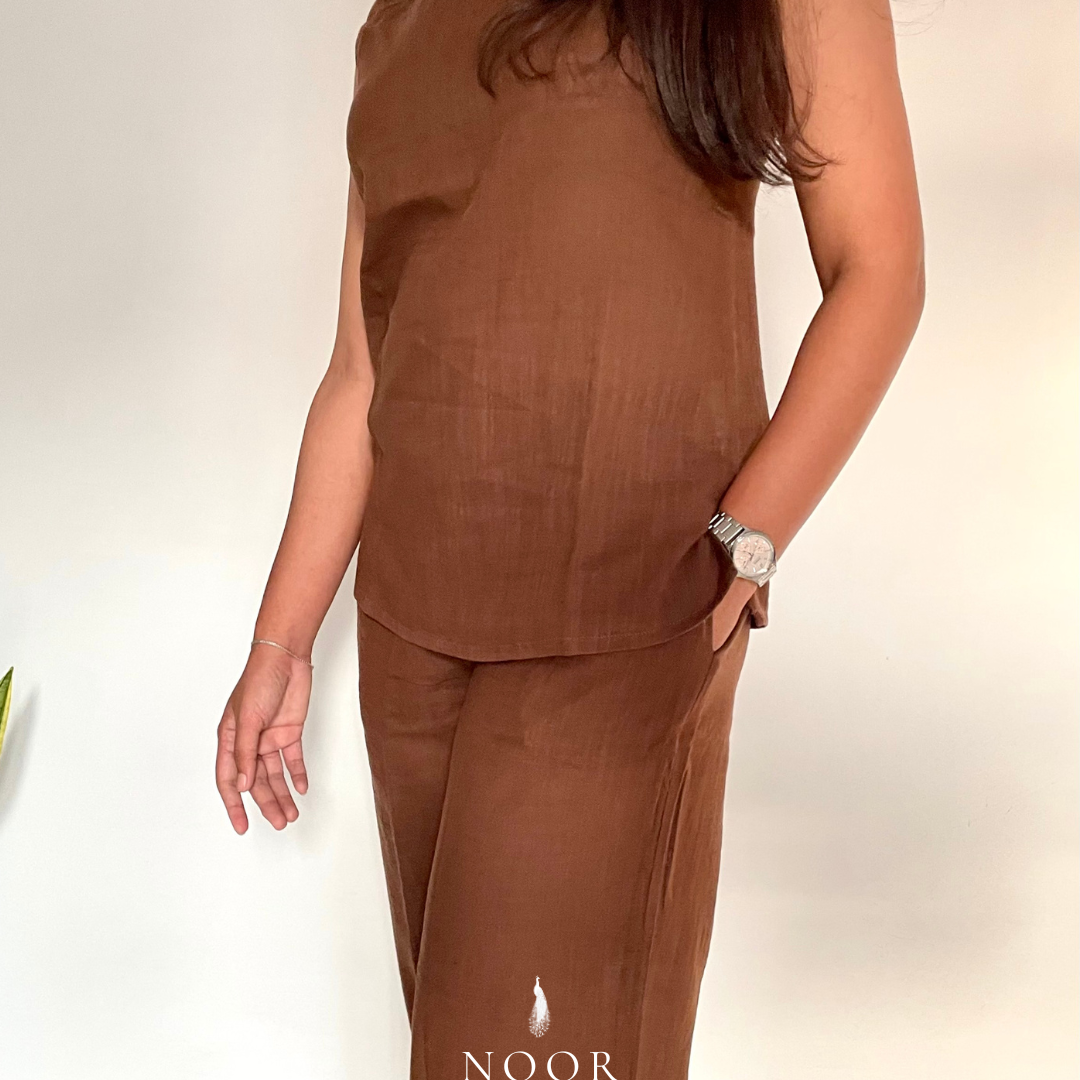 coffee brown cotton noor by hansa v-neck co-ord set that’s as comfy as your favourite loungewear but sharp enough for the office! hand-made from an ultra-soft cotton blend, it stays vibrant wash after wash with zero colour bleeding. perfect for those days when you want to feel cozy and look effortlessly chic!