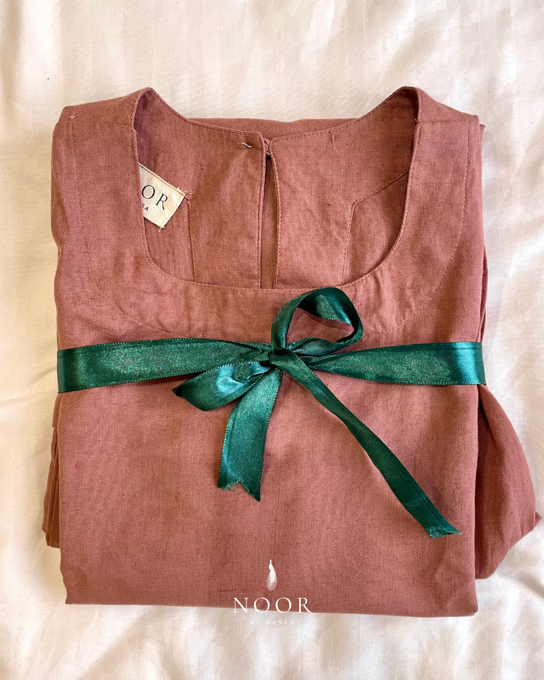 linen sleeveless kurtas brown ecru rose pink black white noor by hansa crafted from a luxe linen-cotton blend that feels as good as it looks. available in five vibrant colours, these would become your wardrobe staples