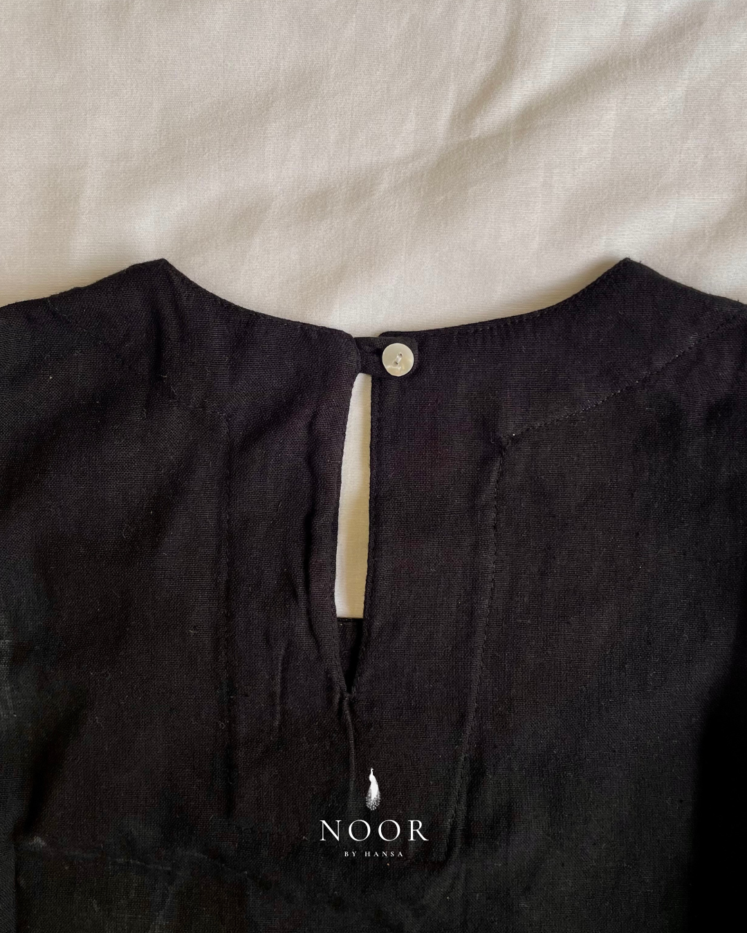 linen sleeveless kurtas brown ecru rose pink black white noor by hansa crafted from a luxe linen-cotton blend that feels as good as it looks. available in five vibrant colours, these would become your wardrobe staples