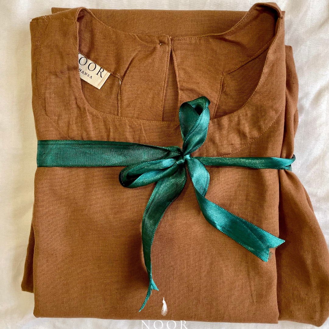 linen sleeveless kurtas brown ecru rose pink black white noor by hansa crafted from a luxe linen-cotton blend that feels as good as it looks. available in five vibrant colours, these would become your wardrobe staples