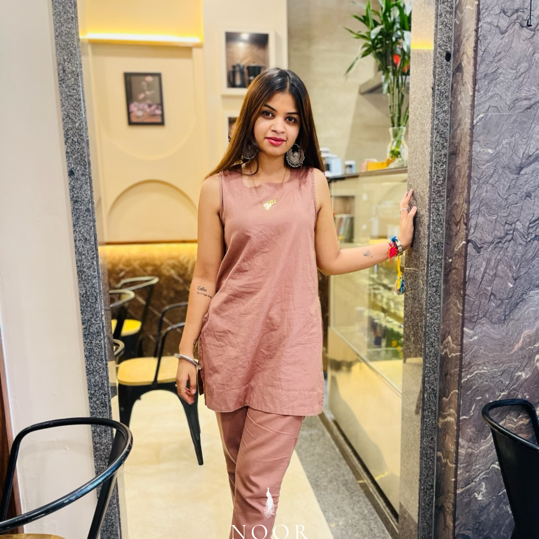 rose cotton linen noor by hansa kurta co-ord set, crafted from a luxe linen-cotton blend that feels as good as it looks. available in five vibrant colours, this playful set is perfect for office wear or a day full of running errands