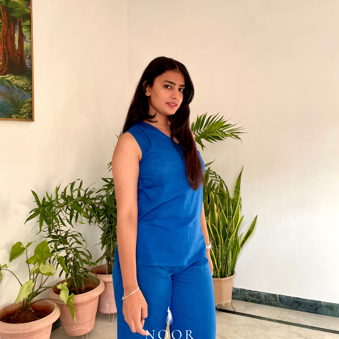 blue cotton noor by hansa v-neck co-ord set that’s as comfy as your favourite loungewear but sharp enough for the office! hand-made from an ultra-soft cotton blend, it stays vibrant wash after wash with zero colour bleeding. perfect for those days when you want to feel cozy and look effortlessly chic!