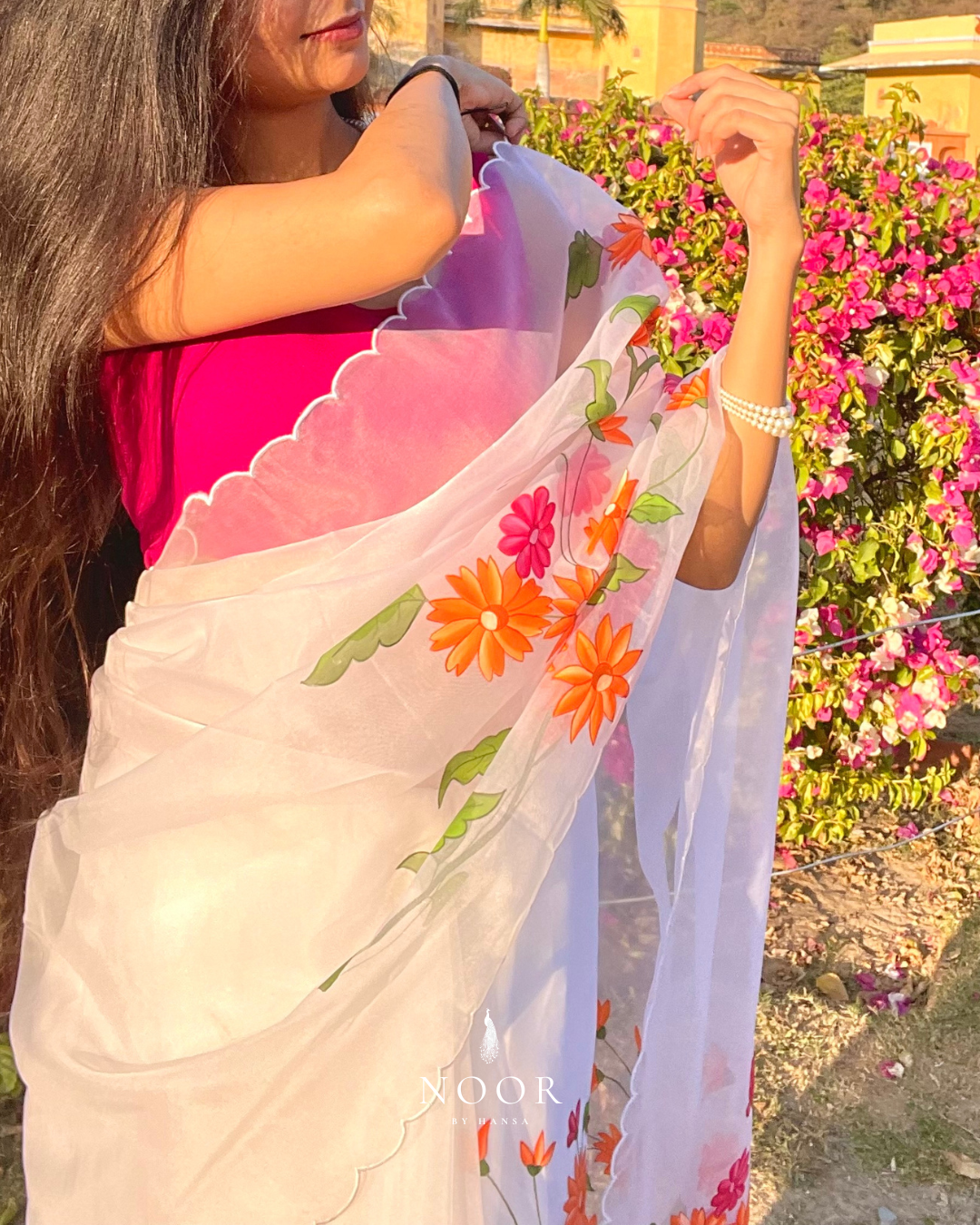 hand painted saree in pure organza silk by noor by hansa in white colour paired with a pure cotton blouse piece & scallop cutwork