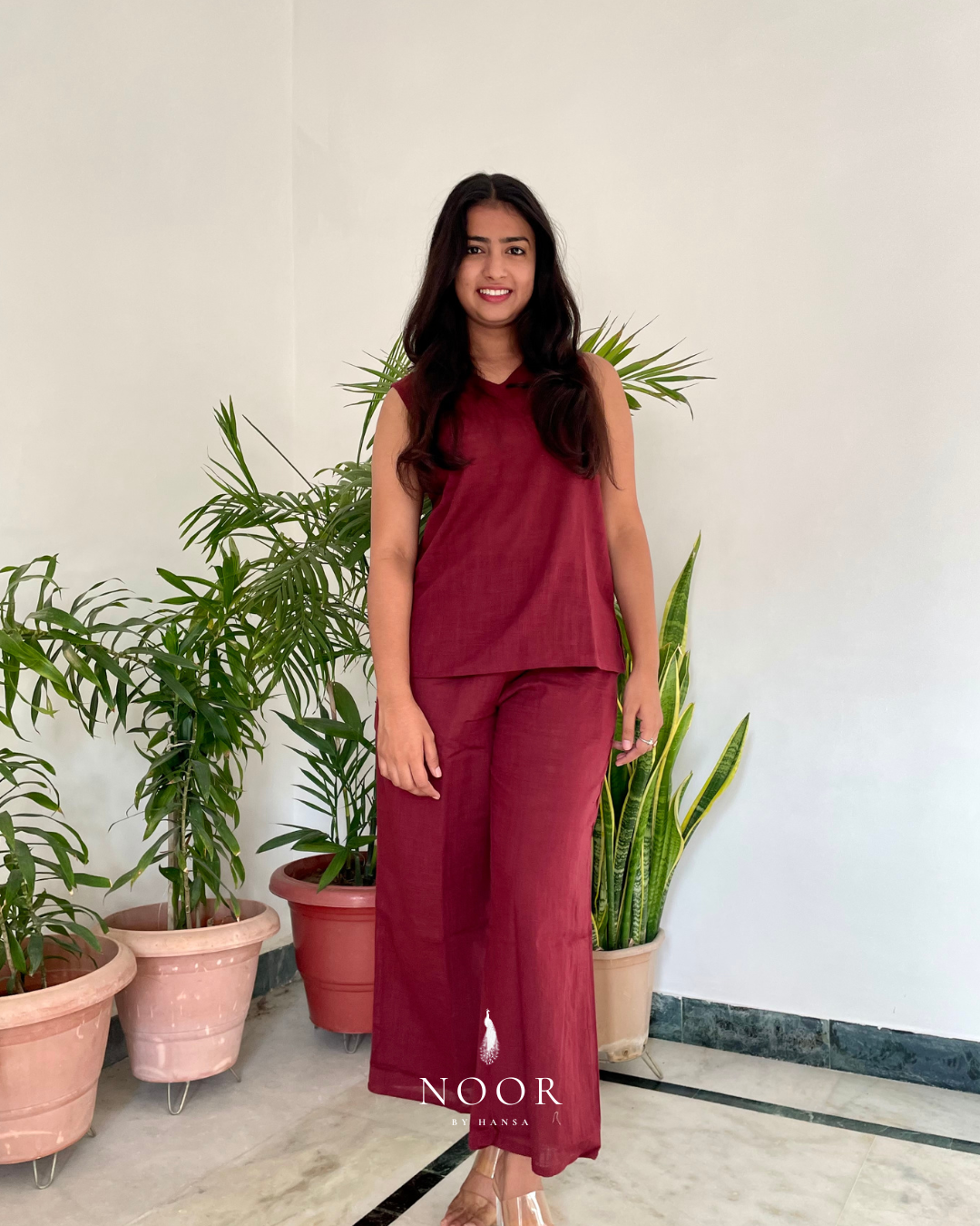 cotton wine noor by hansa v-neck co-ord set that’s as comfy as your favourite loungewear but sharp enough for the office! hand-made from an ultra-soft cotton blend, it stays vibrant wash after wash with zero colour bleeding. perfect for those days when you want to feel cozy and look effortlessly chic!