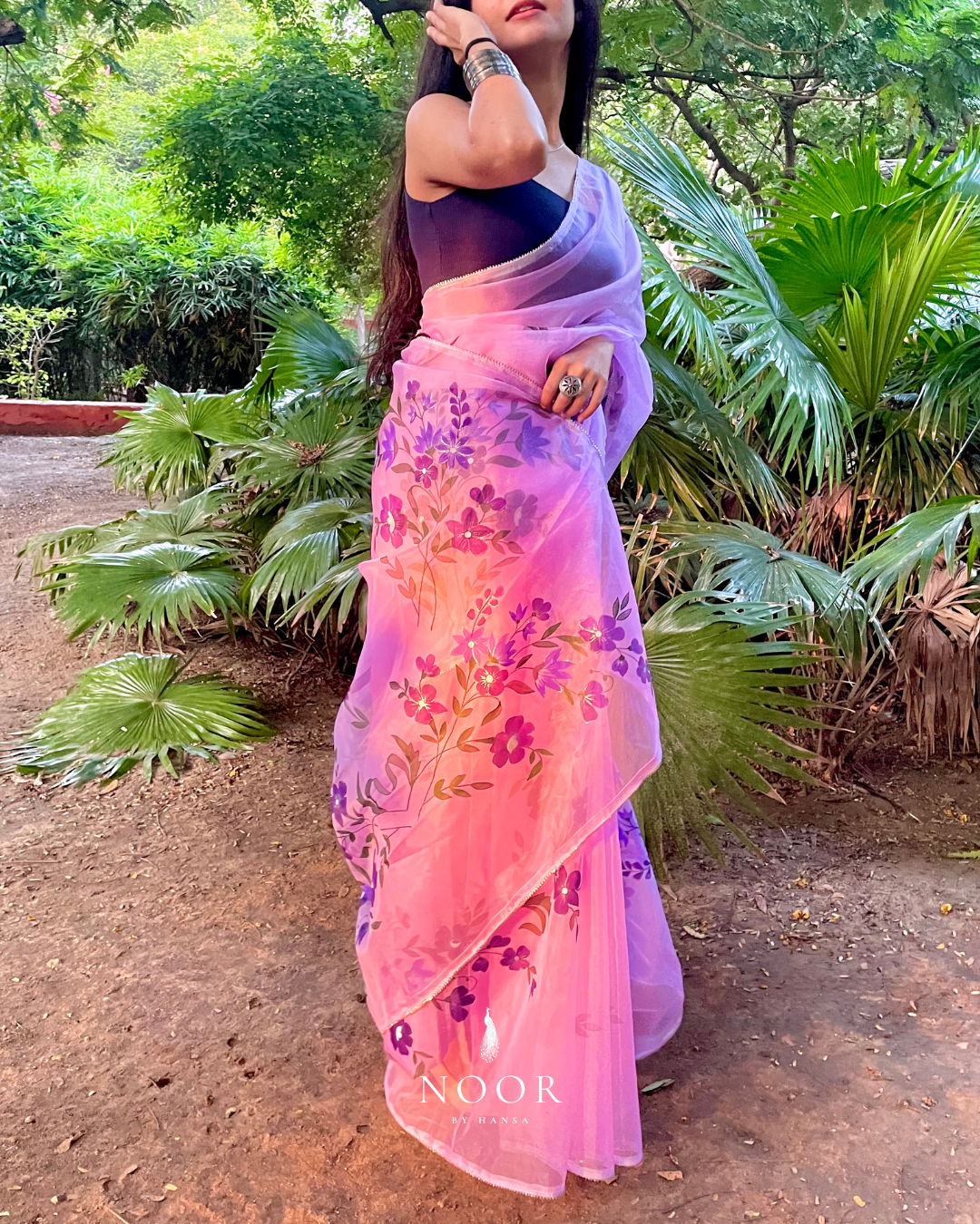 hand painted saree in pure organza silk by noor by hansa in lavender colour paired with a pure cotton blouse piece
