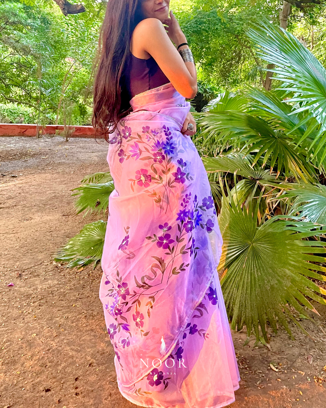 hand painted saree in pure organza silk by noor by hansa in lavender colour paired with a pure cotton blouse piece