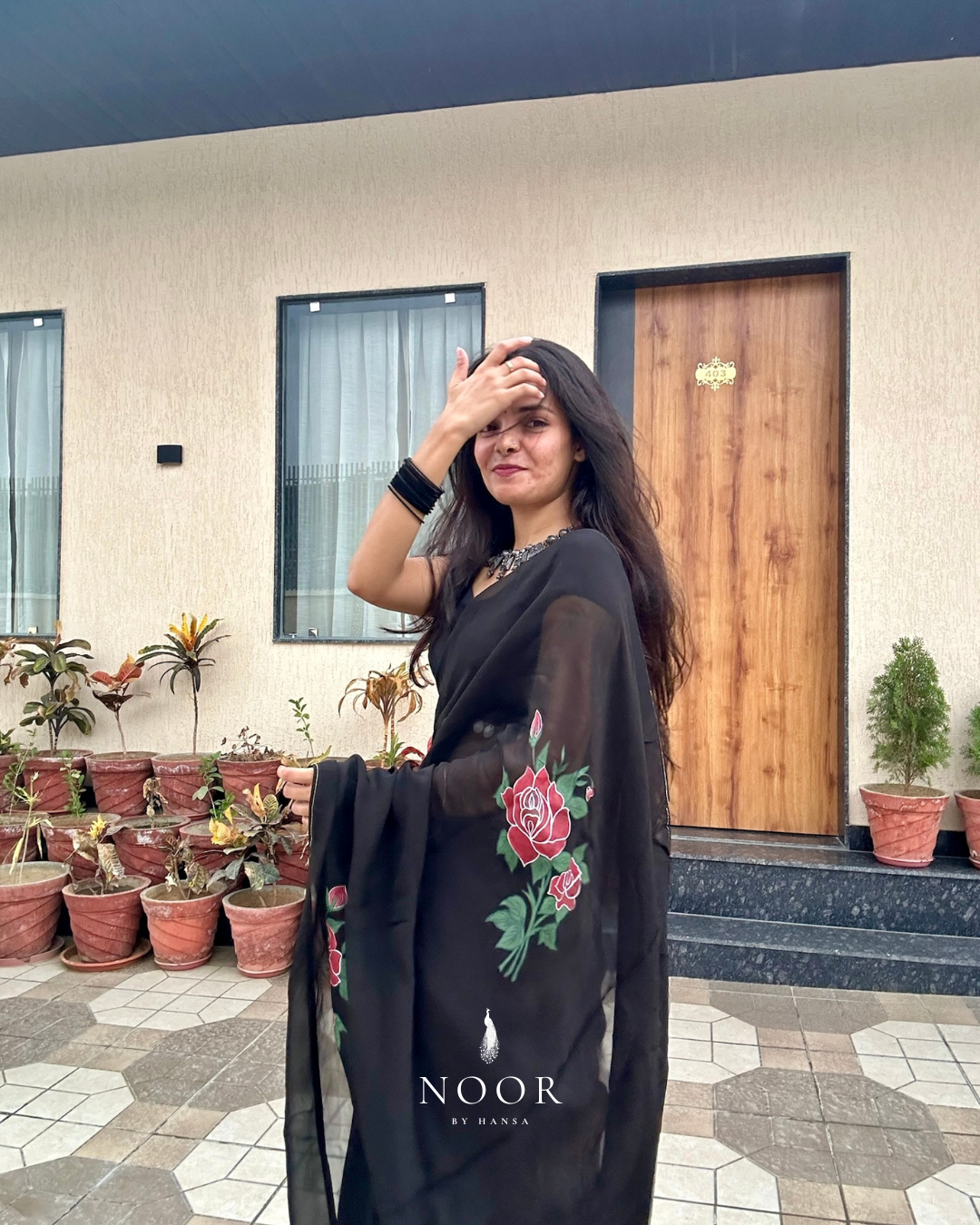 hand painted saree in pure organza silk by noor by hansa in black