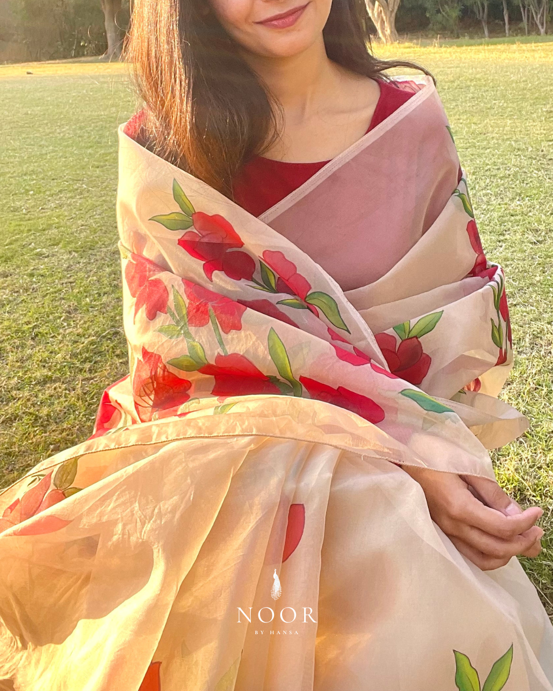 hand painted saree in pure organza silk by noor by hansa in beige colour paired with a pure cotton blouse piece