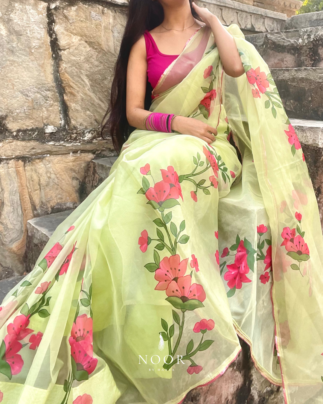 hand painted saree in pure organza silk by noor by hansa in pistachio green colour paired with a pure cotton blouse piece