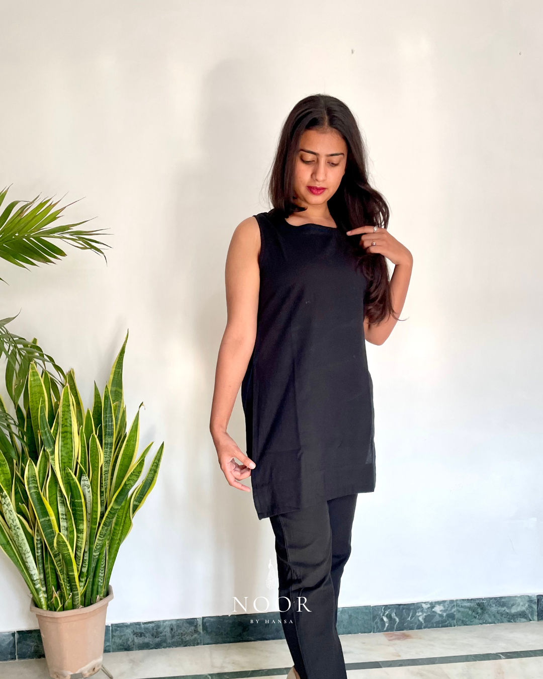 black cotton linen noor by hansa kurta co-ord set, crafted from a luxe linen-cotton blend that feels as good as it looks. available in five vibrant colours, this playful set is perfect for office wear or a day full of running errands