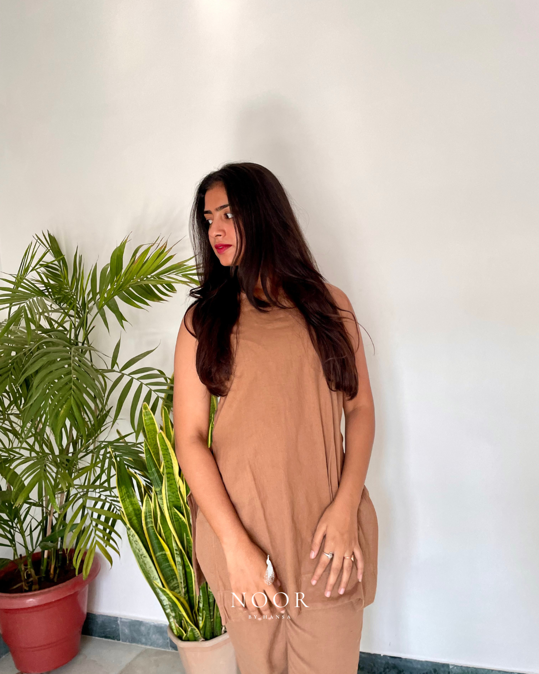 brown cotton linen noor by hansa kurta co-ord set, crafted from a luxe linen-cotton blend that feels as good as it looks. available in five vibrant colours, this playful set is perfect for office wear or a day full of running errands