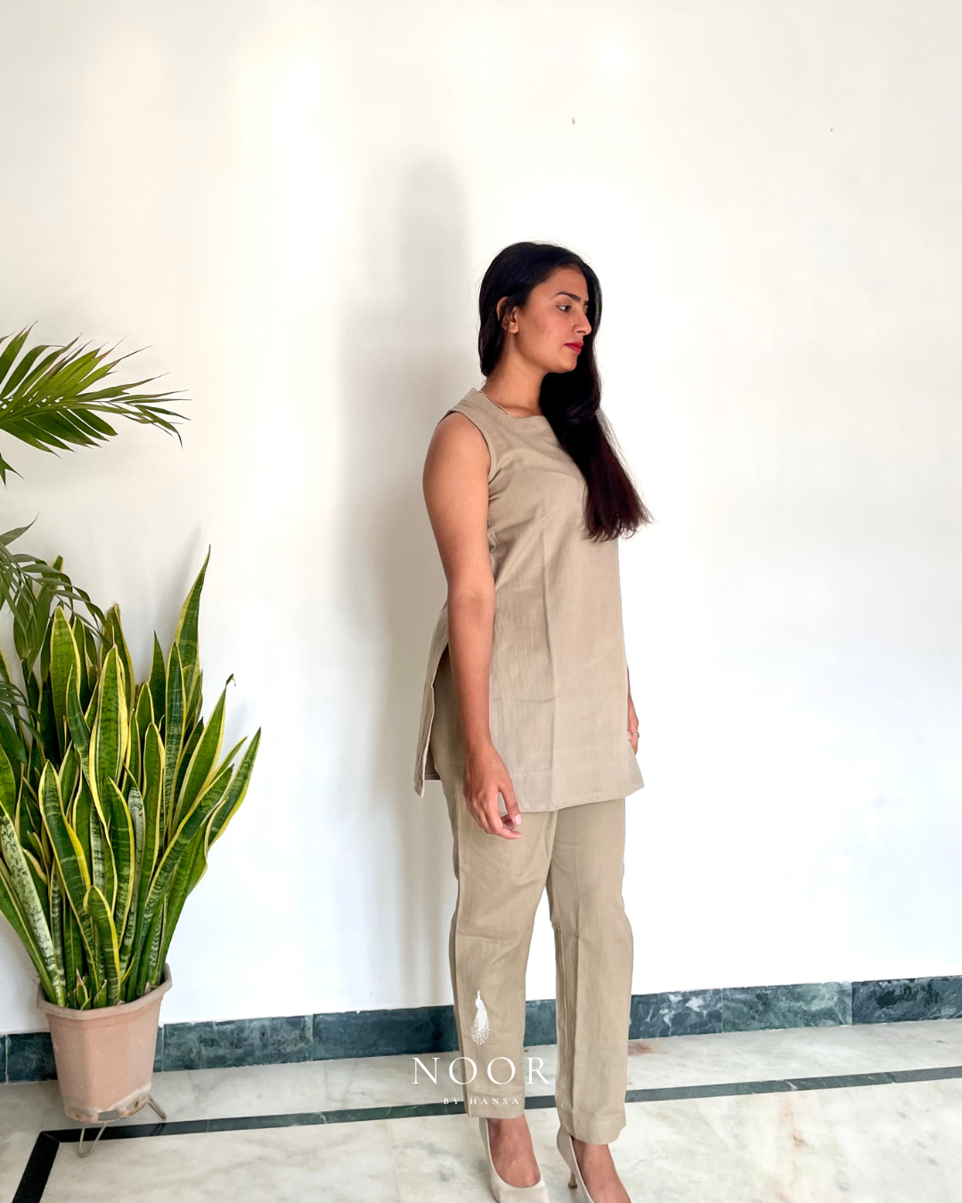 grey cotton linen noor by hansa kurta co-ord set, crafted from a luxe linen-cotton blend that feels as good as it looks. available in five vibrant colours, this playful set is perfect for office wear or a day full of running errands