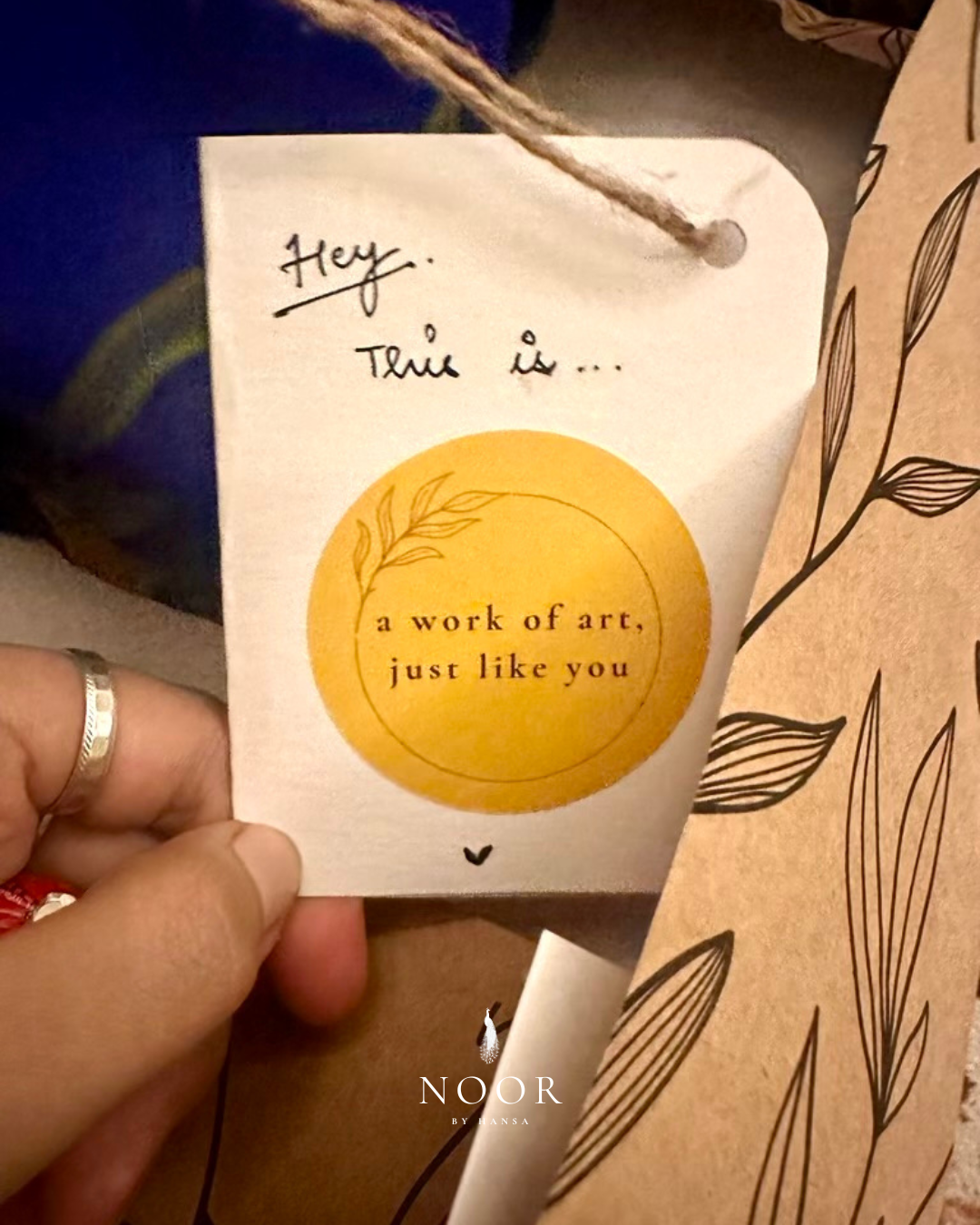 hand painted navy blue 'saba' dupatta in pure organza silk with hand-painted tulip motifs and golden laced borders packaging