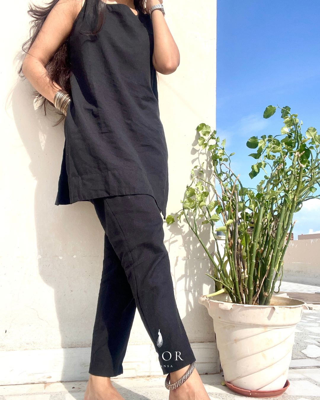 black cotton linen noor by hansa kurta co-ord set, crafted from a luxe linen-cotton blend that feels as good as it looks. available in five vibrant colours, this playful set is perfect for office wear or a day full of running errands