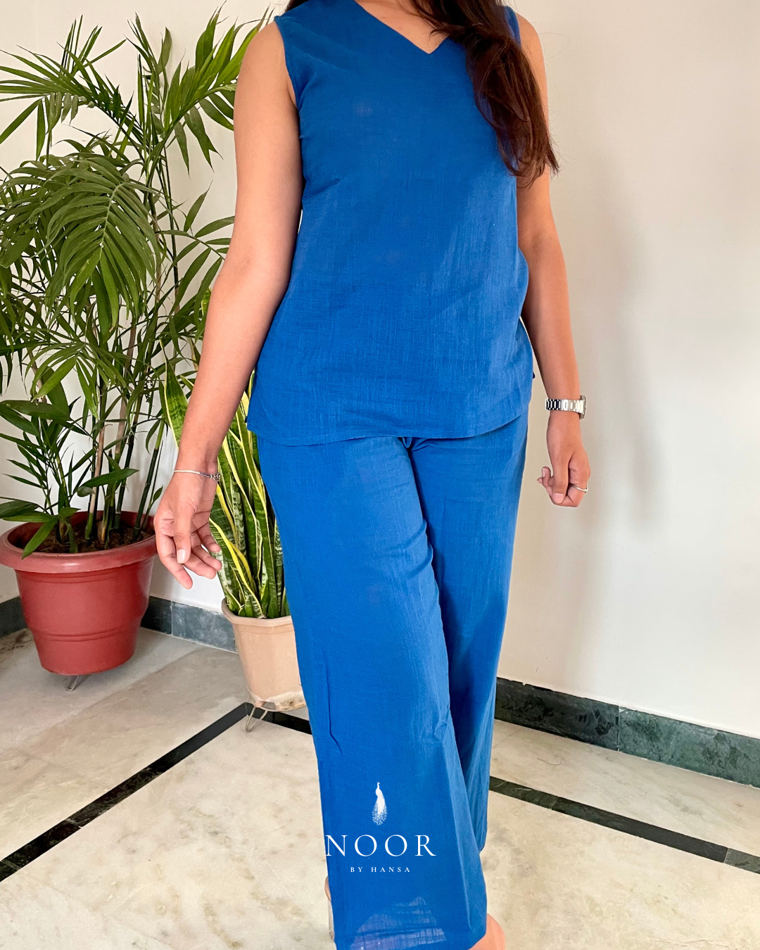blue cotton noor by hansa v-neck co-ord set that’s as comfy as your favourite loungewear but sharp enough for the office! hand-made from an ultra-soft cotton blend, it stays vibrant wash after wash with zero colour bleeding. perfect for those days when you want to feel cozy and look effortlessly chic!