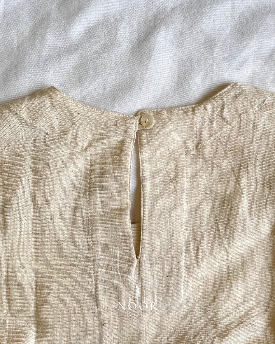 linen sleeveless kurtas brown ecru rose pink black white noor by hansa crafted from a luxe linen-cotton blend that feels as good as it looks. available in five vibrant colours, these would become your wardrobe staples