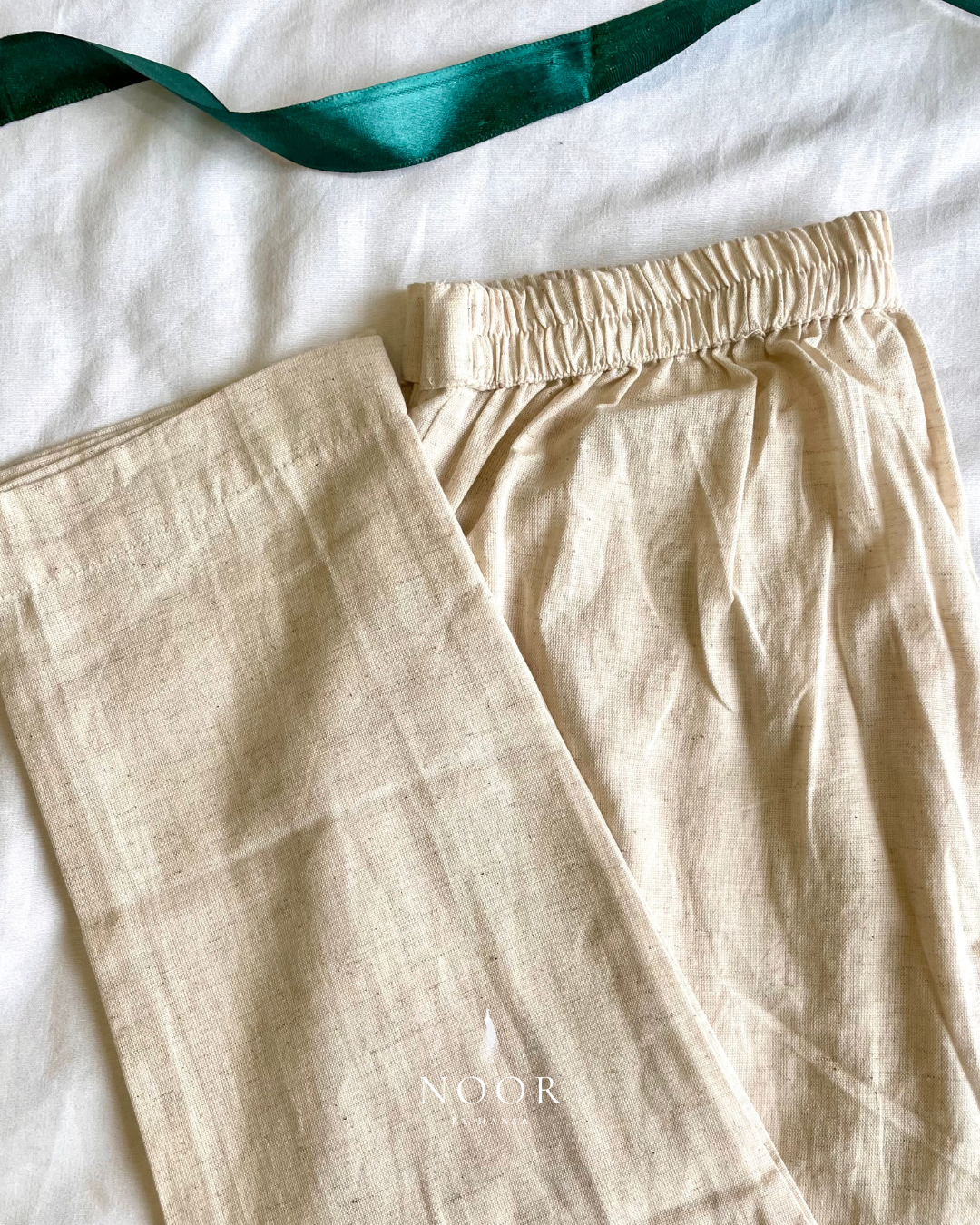 linen straight fit pants noor by hansa rose pink black brown grey ecru white crafted from a luxe linen-cotton blend that feels as good as it looks. available in five vibrant colours, they're really made for the indian body type - no more fitting into what was not made for us!

style tip pair these pants with linen shirts, cotton kurtas or basic tank tops for a chic look on a busy day!