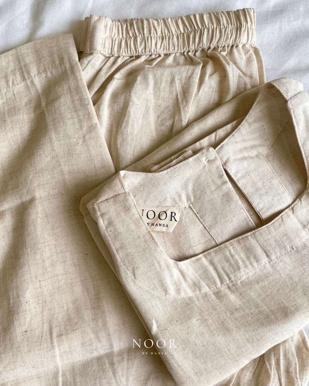 ecru white beige cotton linen noor by hansa kurta co-ord set, crafted from a luxe linen-cotton blend that feels as good as it looks. available in five vibrant colours, this playful set is perfect for office wear or a day full of running errands