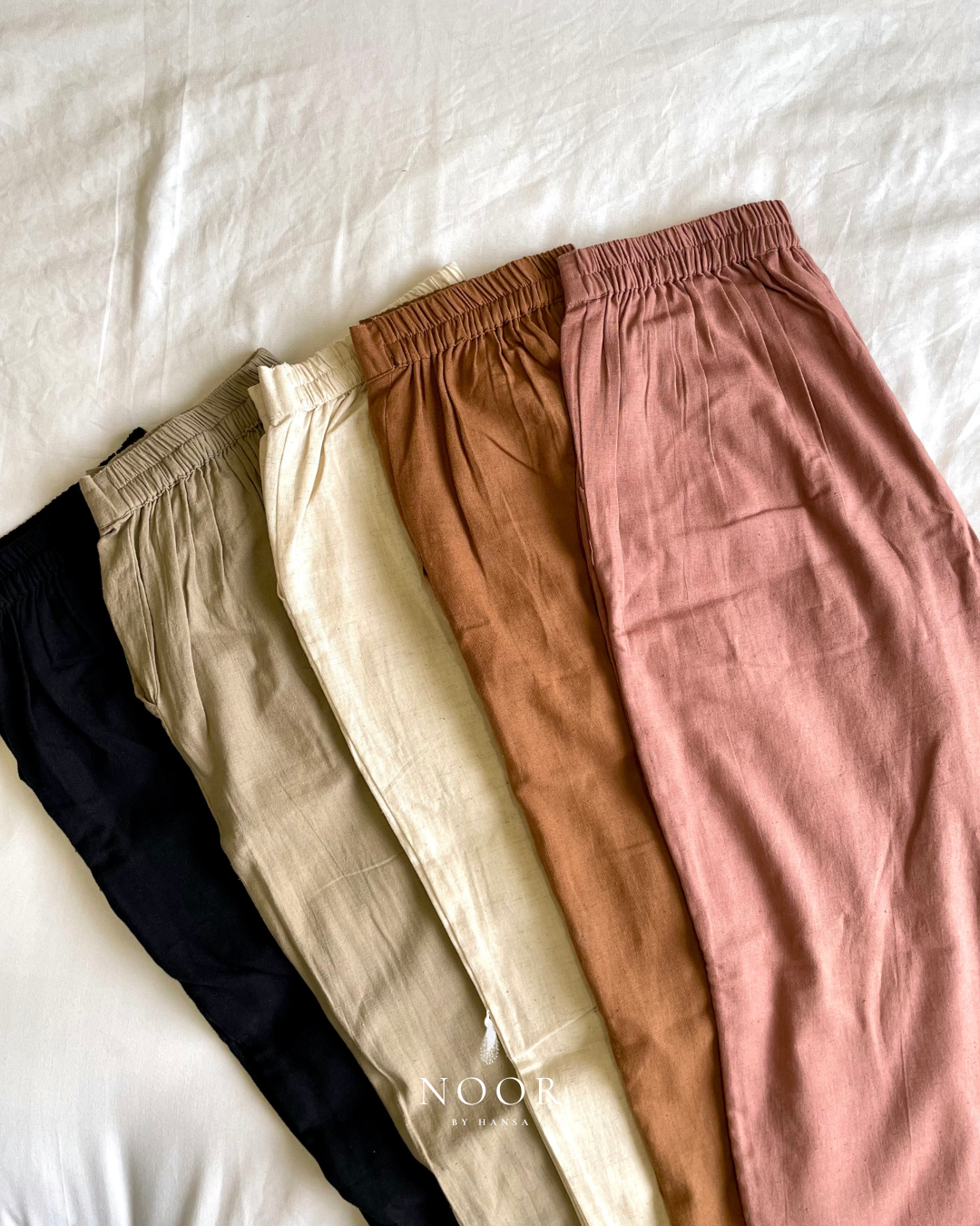 linen straight fit pants noor by hansa rose pink black brown grey ecru white crafted from a luxe linen-cotton blend that feels as good as it looks. available in five vibrant colours, they're really made for the indian body type - no more fitting into what was not made for us!

style tip pair these pants with linen shirts, cotton kurtas or basic tank tops for a chic look on a busy day!